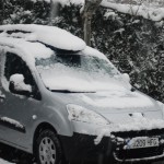 Sneeuw op de auto